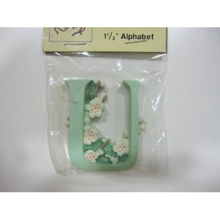 "U". Letra de resina