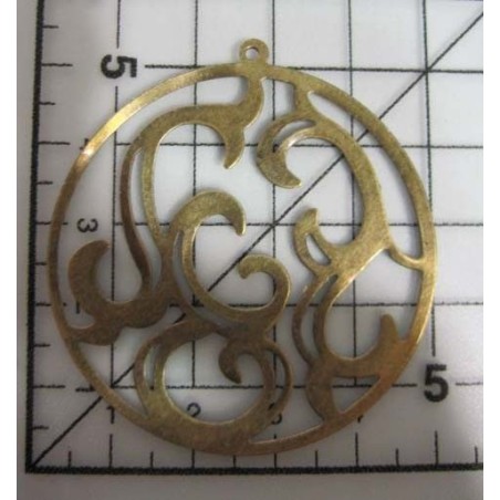 Decoración de metal dorada. Circulo con volutas. Ø 5 cm. Fabscraps