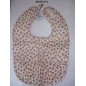 Babero plastificado decorado con motivos florales