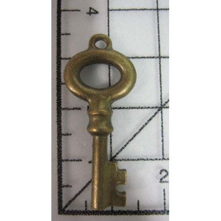 Decoración de metal dorada. Colgante llave antigua. 3 x 2 cm. Fabscraps