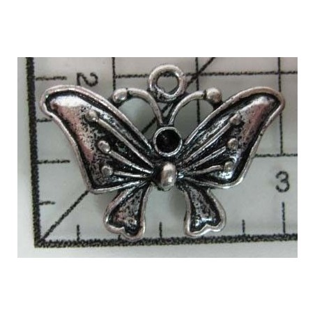Decoración de metal plateada. Colgante mariposa forma lazo. 2 x 3 cm. Fabscraps